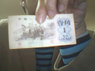 [灌水]男子珍藏一角钱“币王”价格高达1.3万(图)