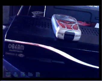 手机与DM完美组合，既能看卫视，又能打电话